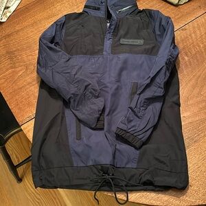 Unisex rain coat. Size XXS but fits like a women’s small